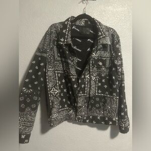 This is a Valabasas men's black and white bandana print denim jean jacket.